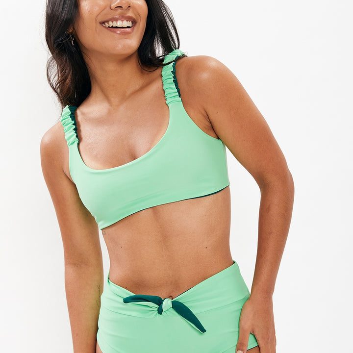 Top Brisas verde esmeralda reversible a menta neón