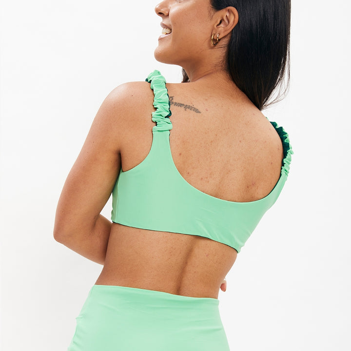 Top Brisas verde esmeralda reversible a menta neón