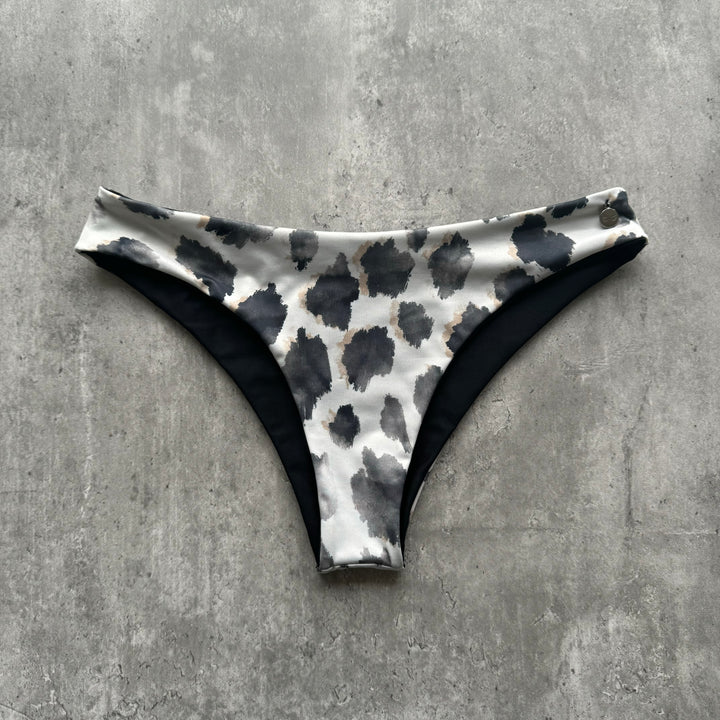 Braguita gaviotas animal print reversible a negro