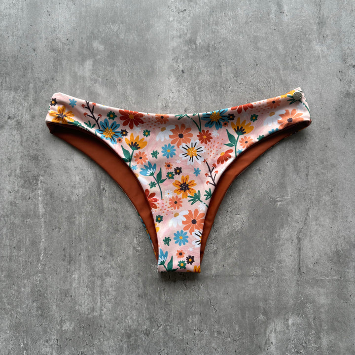 Braguita gaviotas flores durazno print reversible a tierra