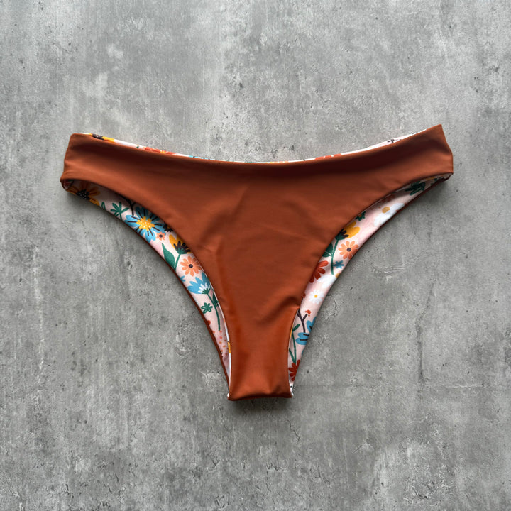 Braguita gaviotas flores durazno print reversible a tierra