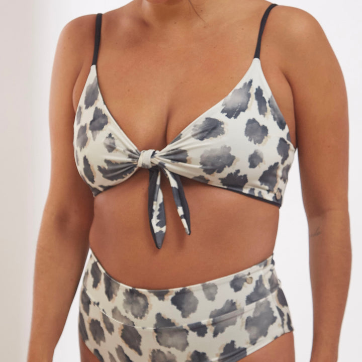 Top Santa María animal print reversible a negro